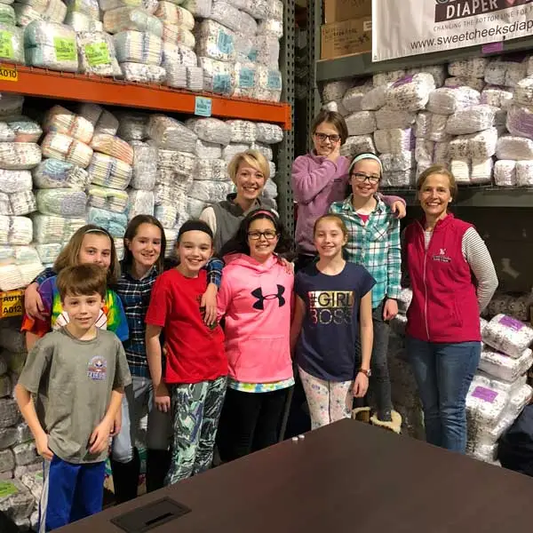 Volunteers at the COVERD warehouse.